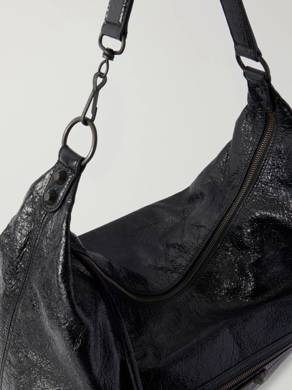 Close-up detail of the Balenciaga Le City Hobo Large Embellished Leather Shoulder Bag