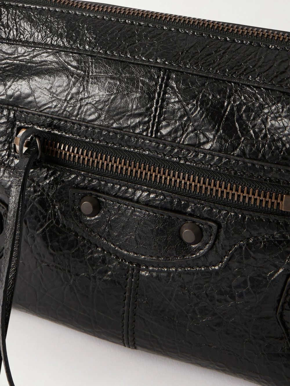 Close-up detail of the Balenciaga Le City Moto Mini Crinkled-leather Shoulder Bag