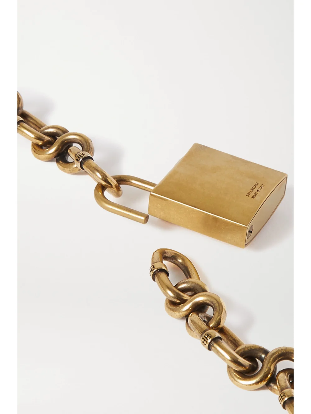 Back view of the Balenciaga Lock Embossed Gold-tone Necklace