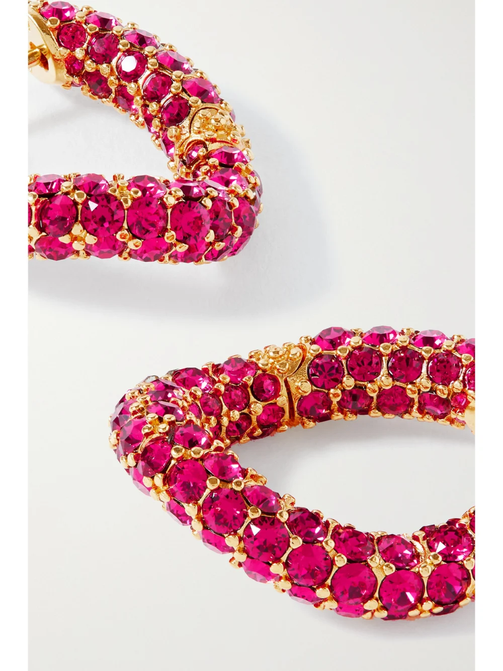 Close-up detail of the Balenciaga Loop Xs Gold-tone Crystal Hoop Earrings
