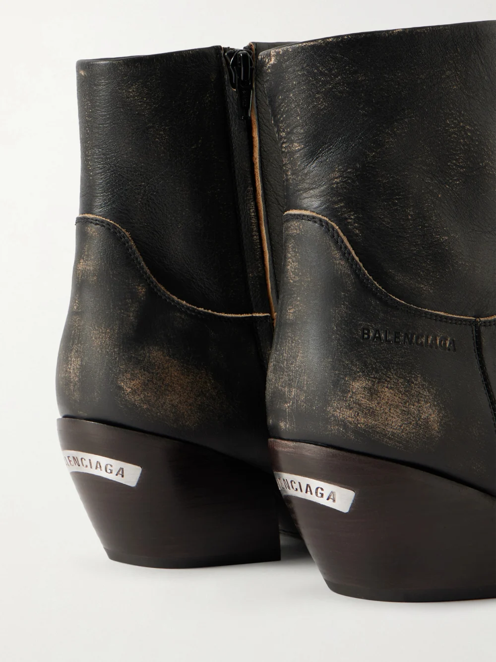 Close-up detail of the Balenciaga Memphis Distressed Leather Cowboy Boots