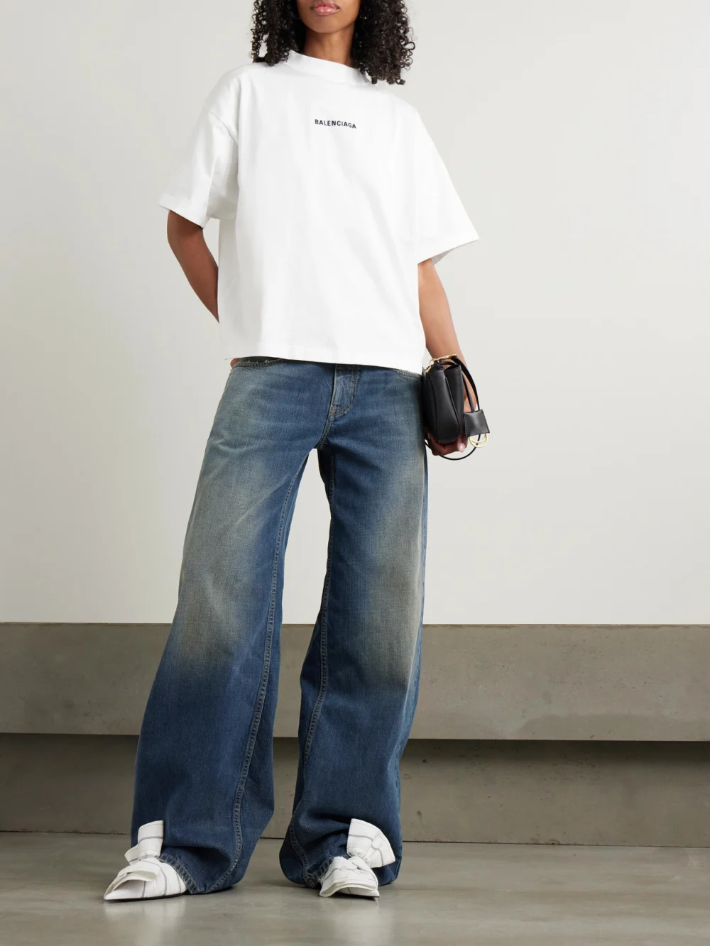 Balenciaga Mid-rise Wide-leg Jeans, worn by a model