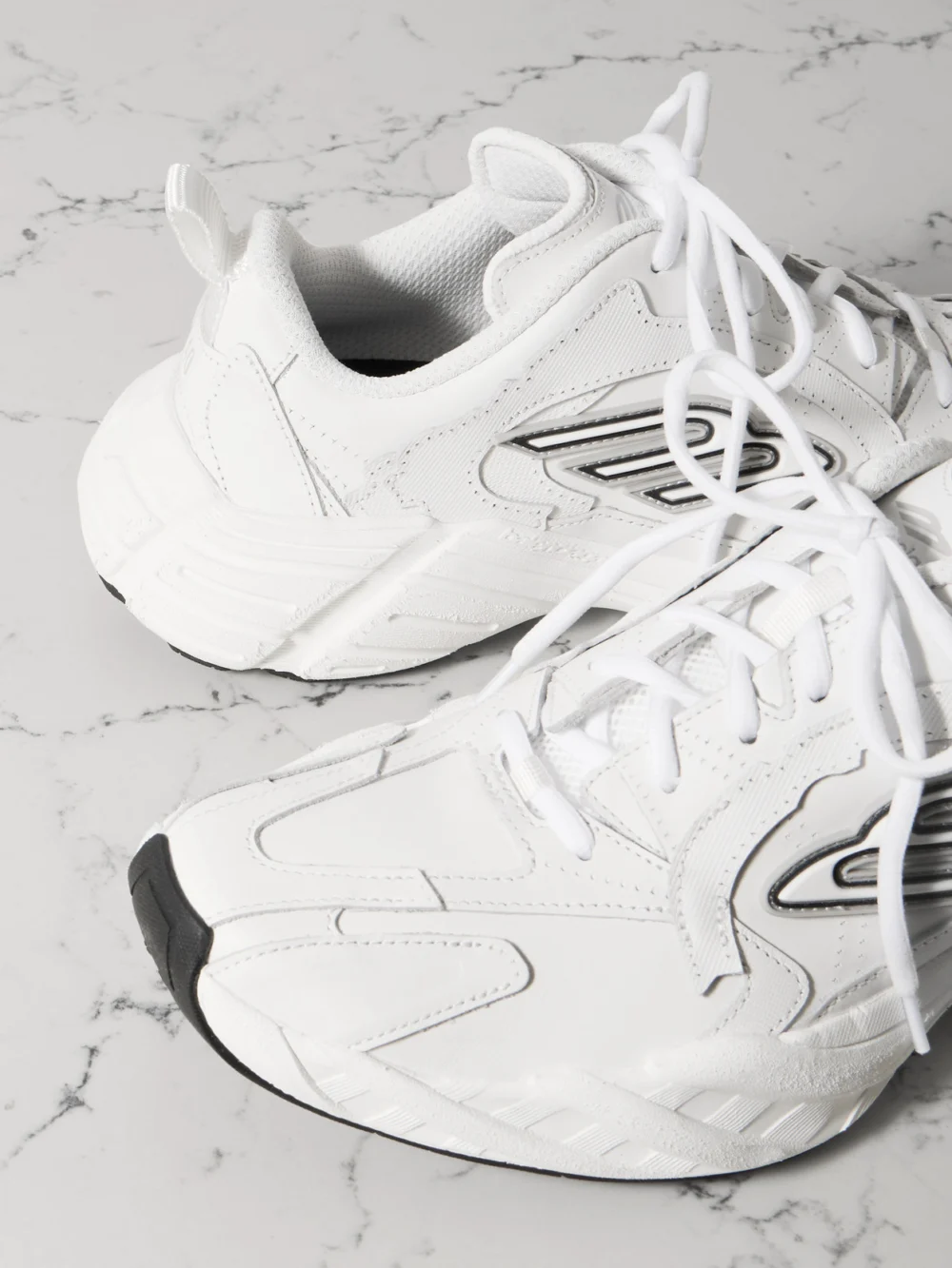 Close-up detail of the Balenciaga Monday Rubber-trimmed Leather Sneakers