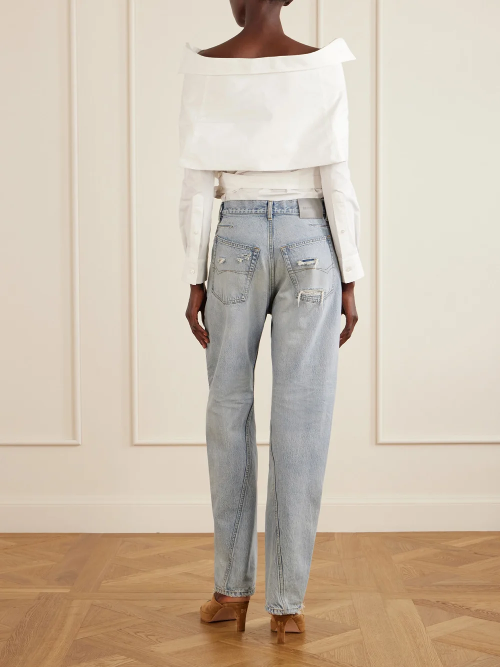 Back view of the Balenciaga Off-the-shoulder Cotton Poplin Blouse