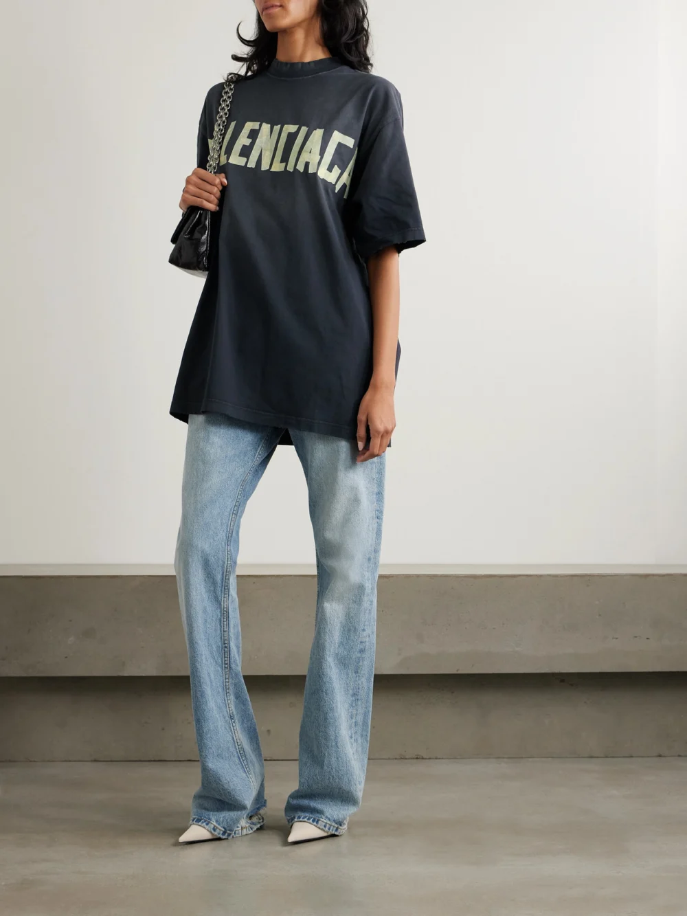 Balenciaga Oversized Distressed Printed Cotton-jersey T-shirt, worn by a model