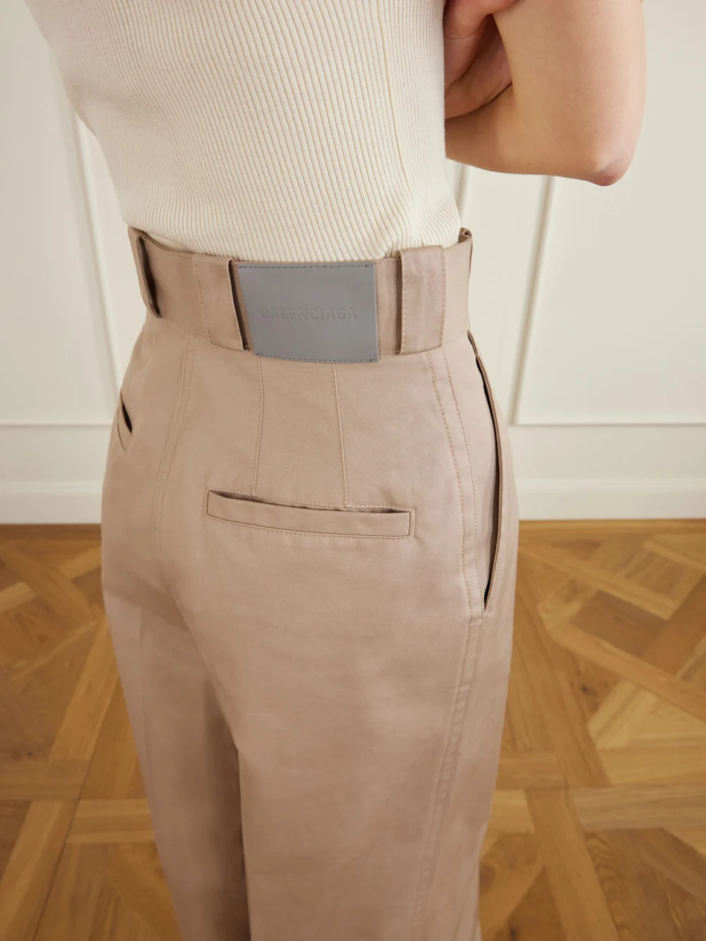 Close-up detail of the Balenciaga Pleated Cotton Wide-leg Pants