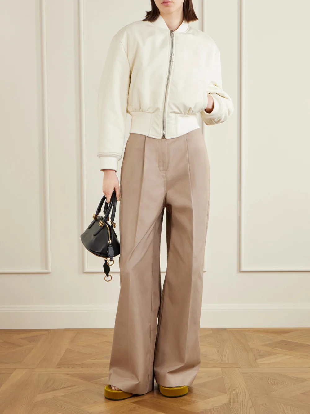 Balenciaga Pleated Cotton Wide-leg Pants, worn by a model