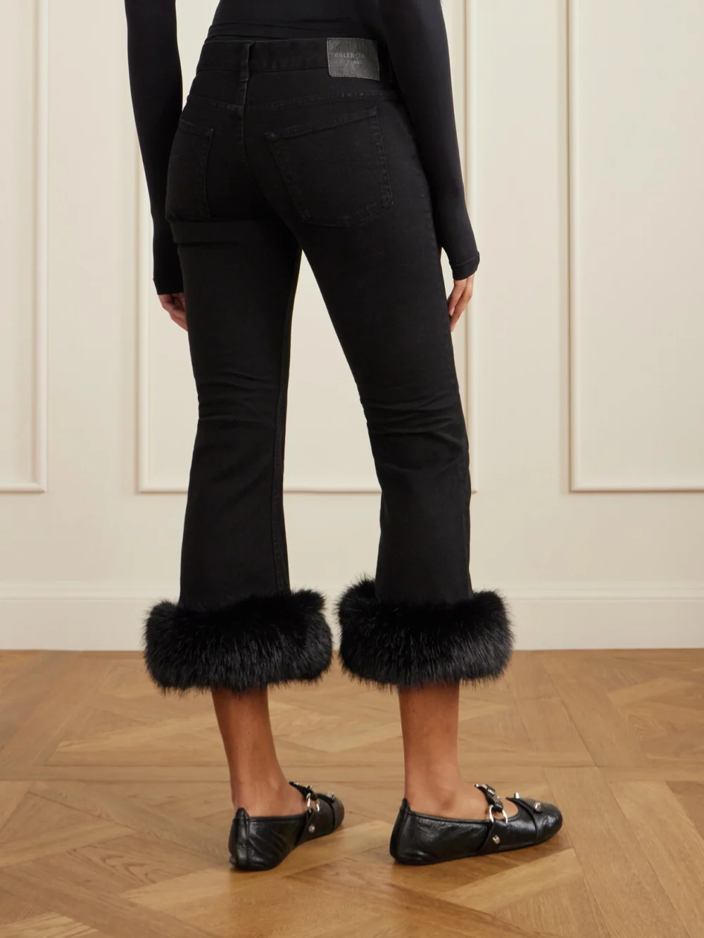 Back view of the Balenciaga Plush-trimmed Cropped Mid-rise Flared Jeans