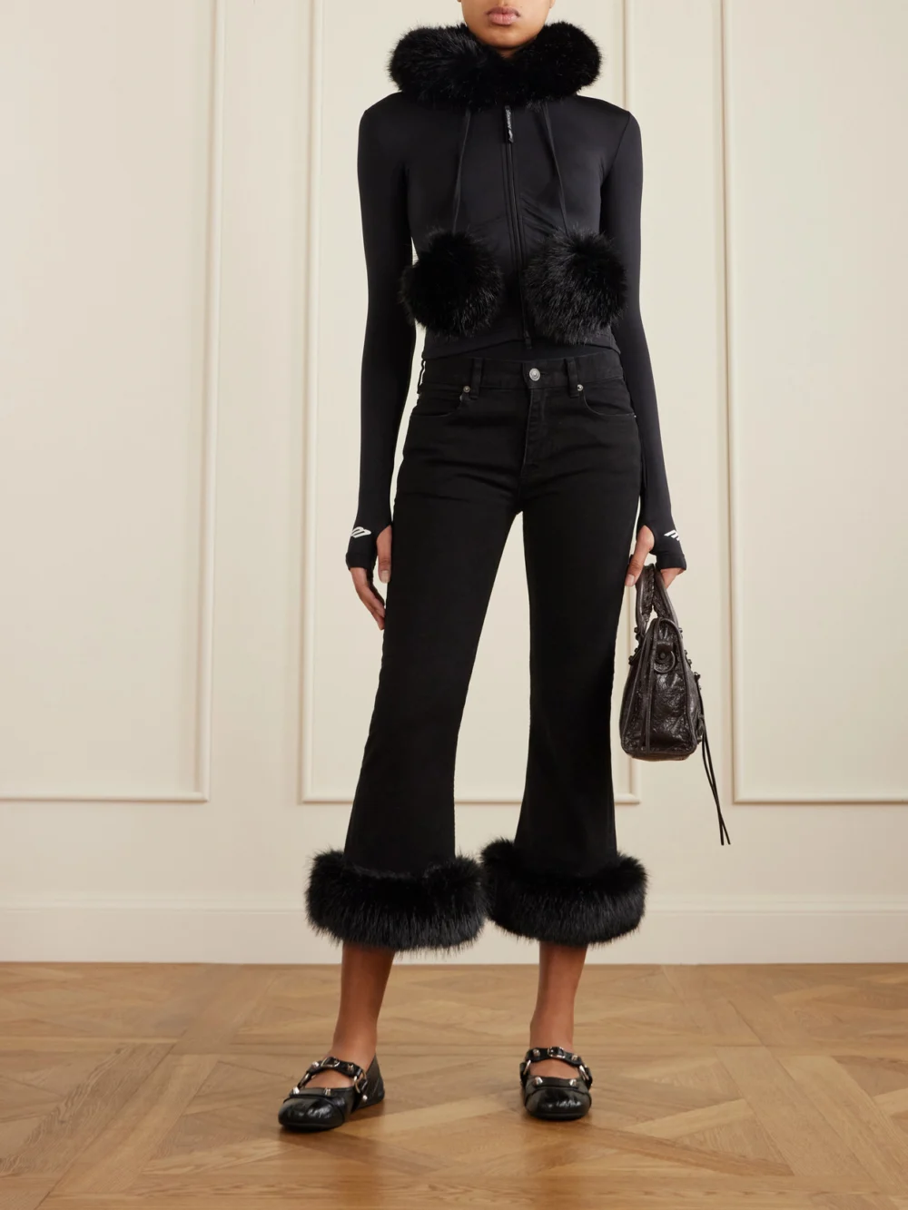Balenciaga Plush-trimmed Cropped Mid-rise Flared Jeans, worn by a model