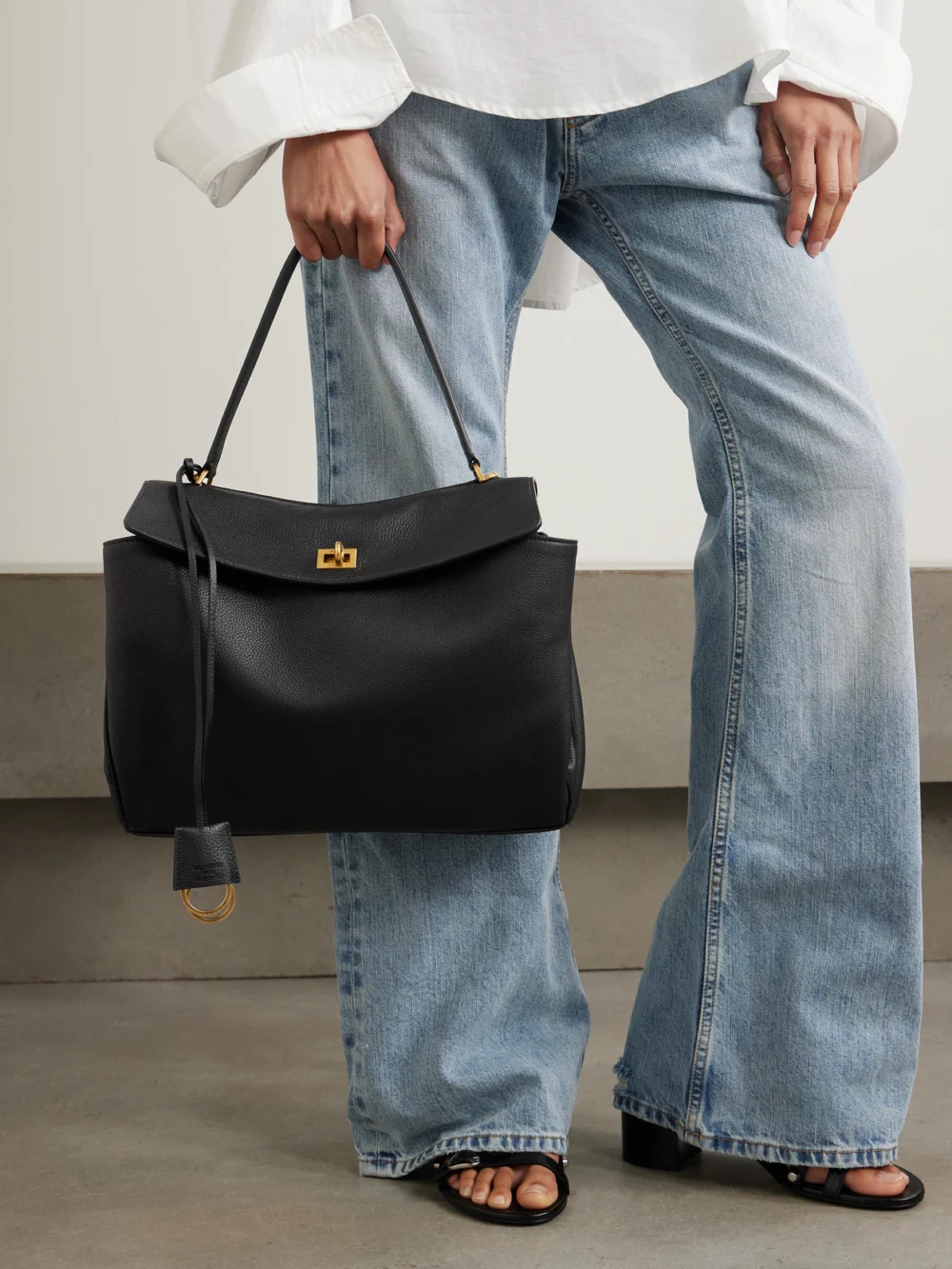 Balenciaga Rodeo Medium Textured-leather Shoulder Bag, styled view