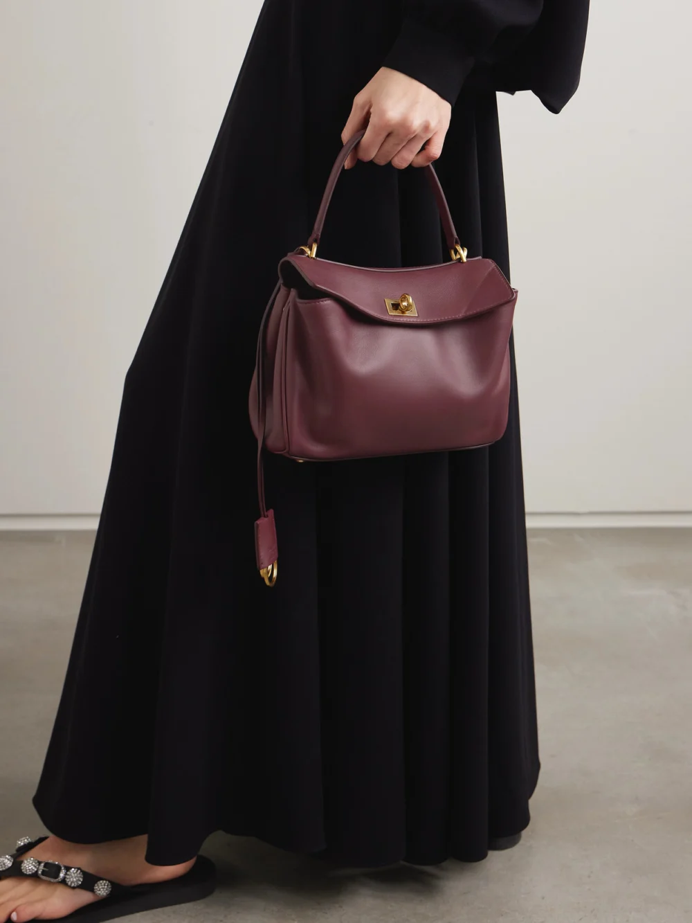 Balenciaga Rodeo Mini Leather Top-handle Bag, styled view