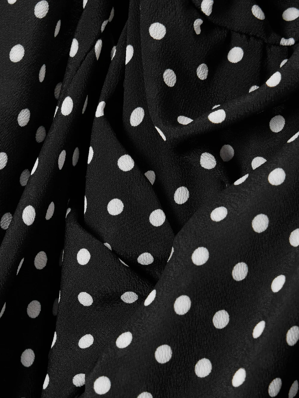 Close-up detail of the Balenciaga Ruffled Gathered Polka-dot Crepe De Chine Blouse