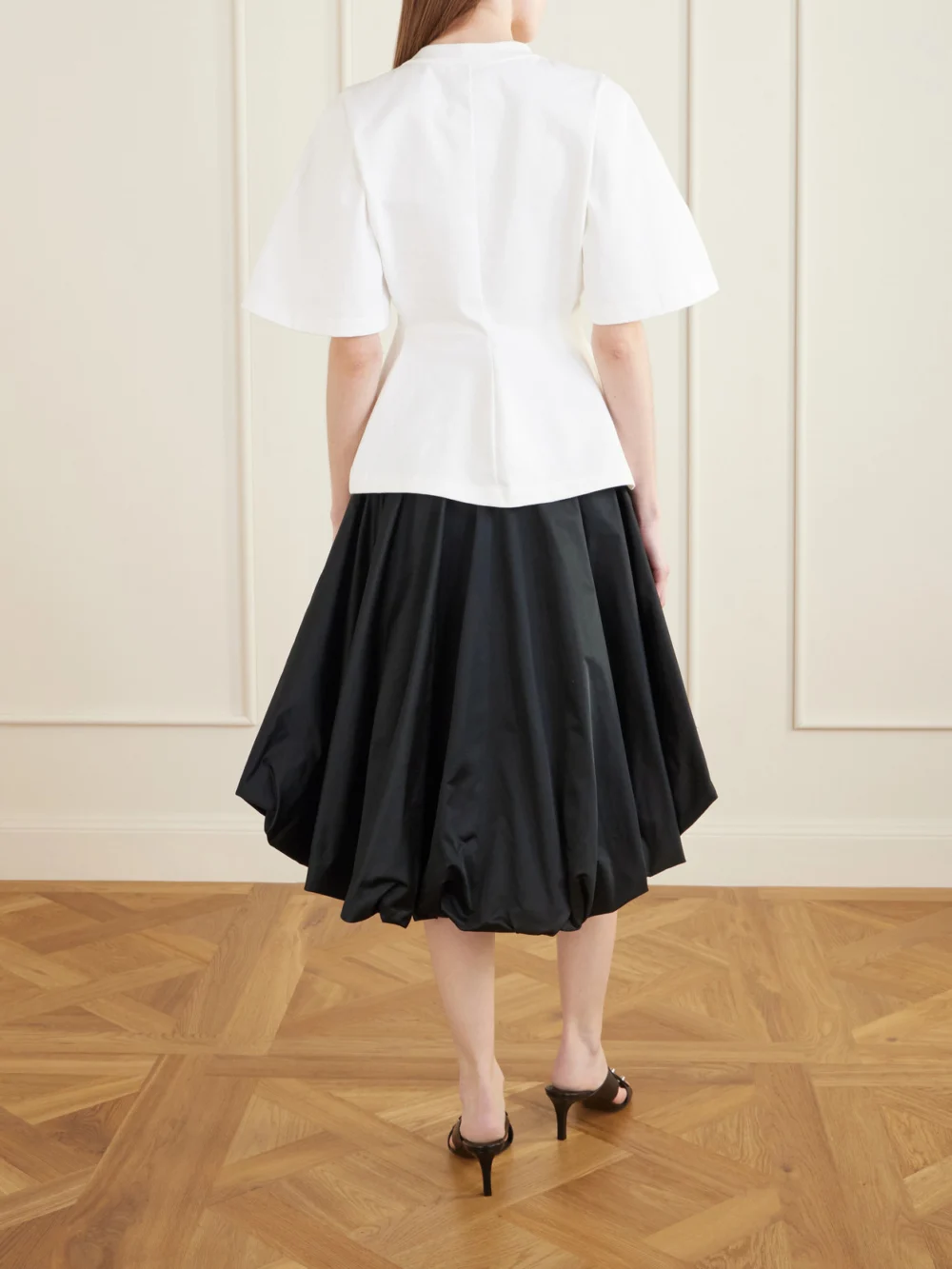 Back view of the Balenciaga Shaped Flared Cotton-jersey T-shirt