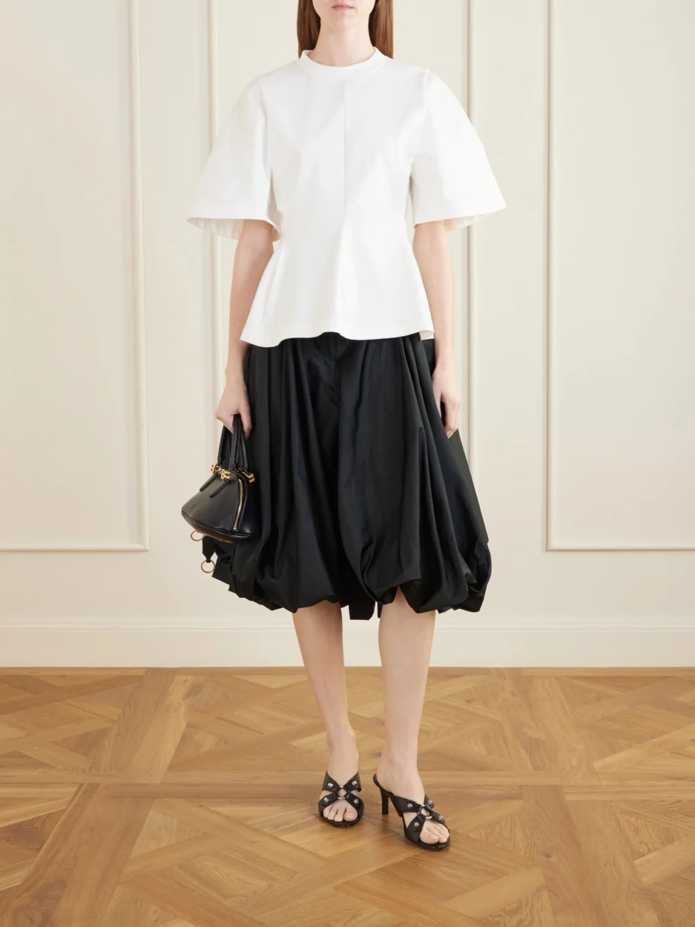 Balenciaga Shaped Flared Cotton-jersey T-shirt, worn by a model
