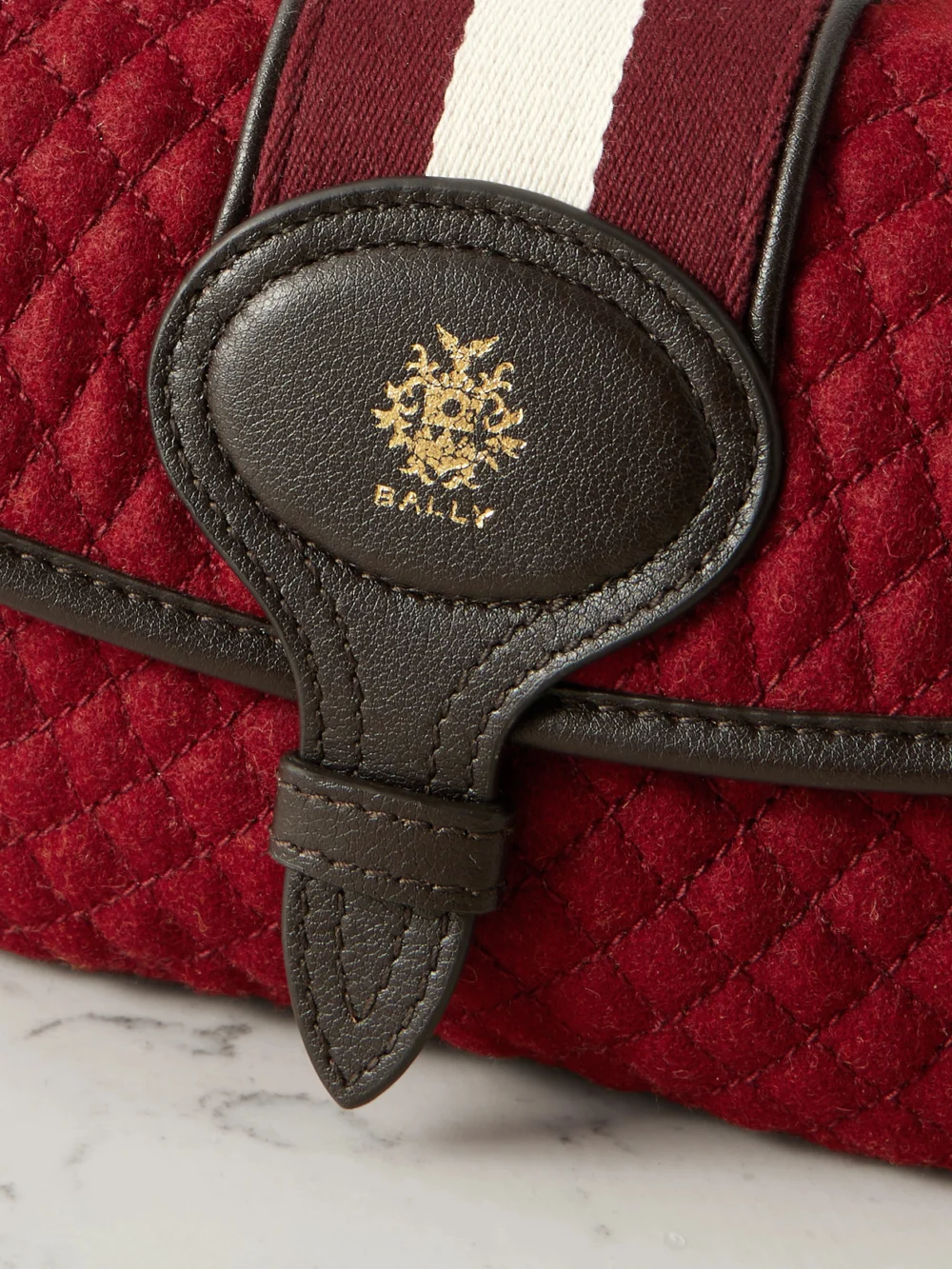 Close-up detail of the Bally Quilted Webbing and Leather-trimmed Wool-bouclé Shoulder Bag