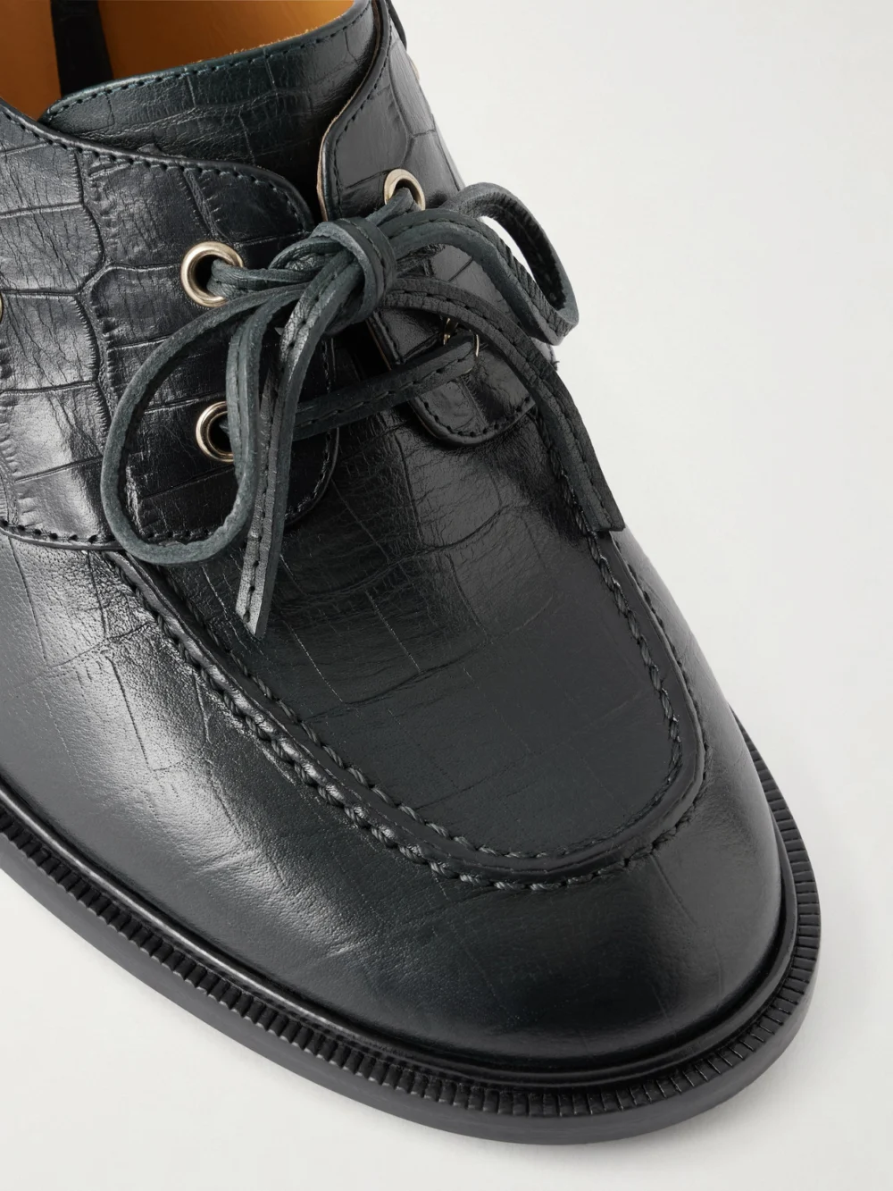 Close-up detail of the Bally Saule Croc-effect Leather Pumps