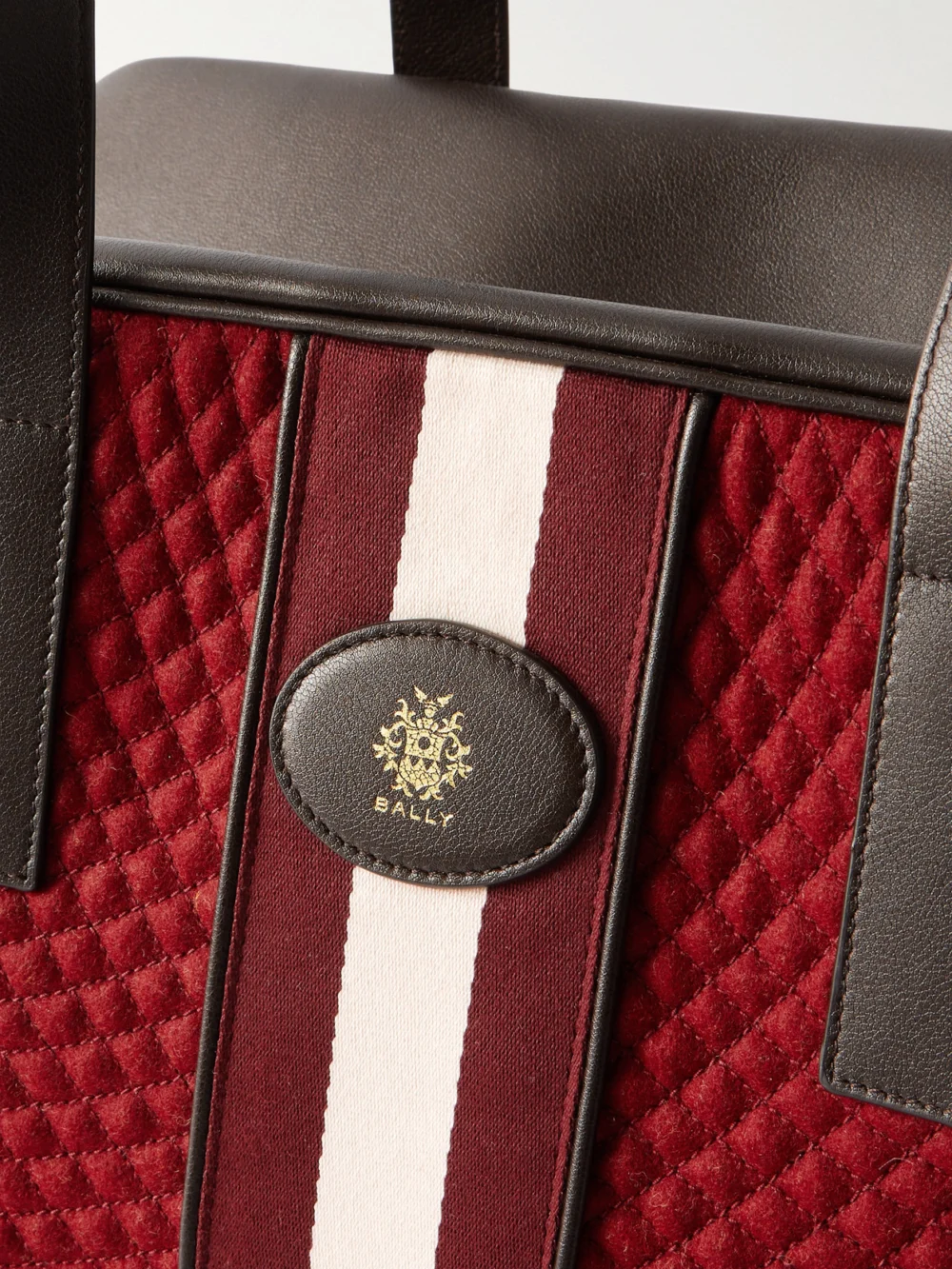 Close-up detail of the Bally Weekender Leather and Striped Canvas-trimmed Quilted Felt Tote