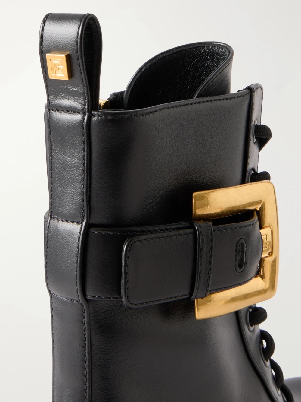 Close-up detail of the Balmain Anthem Belt-detailed Leather Ankle Boots