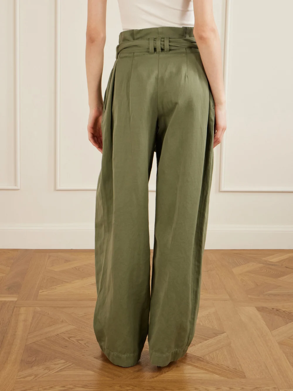 Back view of the Balmain Belted Pleated Cotton and Linen-blend Twill Tapered Pants