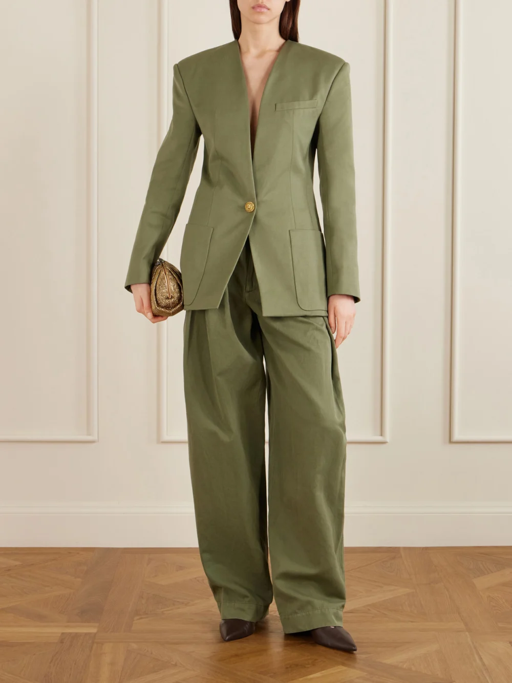 Balmain Belted Pleated Cotton and Linen-blend Twill Tapered Pants, worn by a model