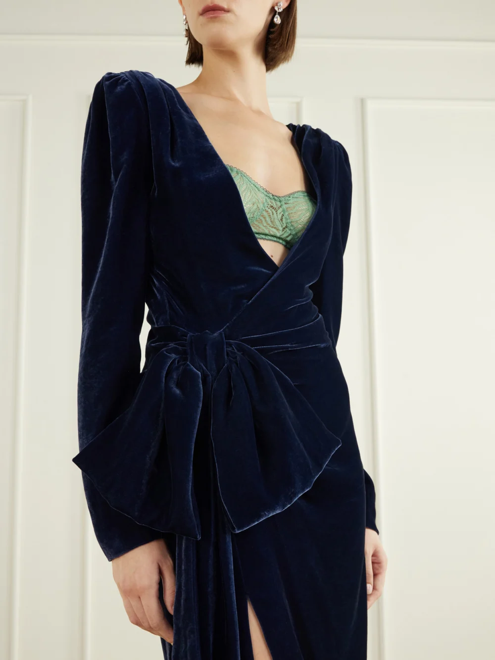 Close-up detail of the Balmain Bow-detailed Velvet Midi Dress