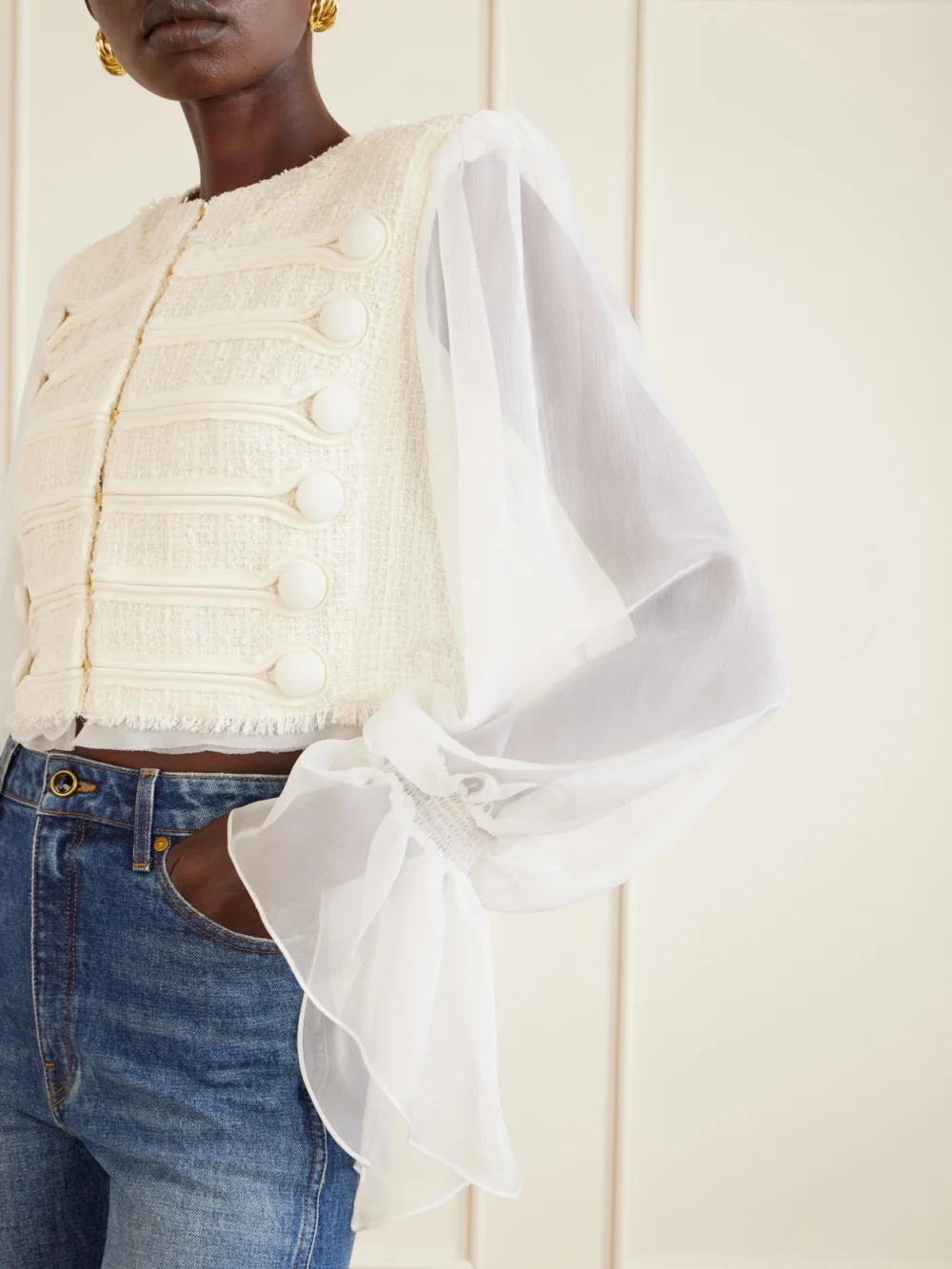 Close-up detail of the Balmain Brandebourg Tweed Blouse