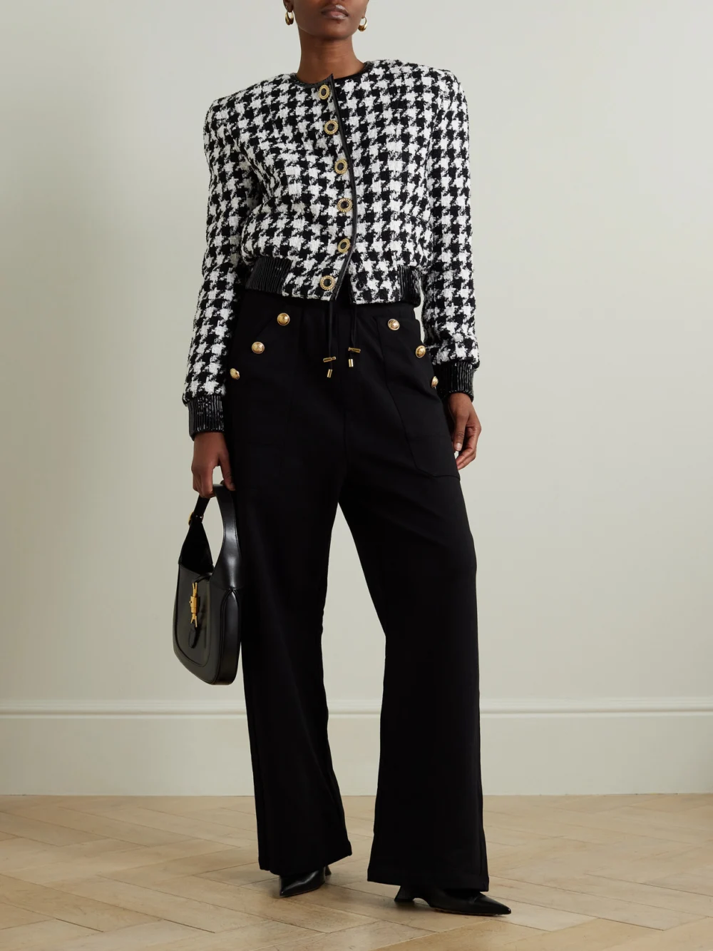 Balmain Button-embellished Faux Patent Leather-trimmed Houndstooth Tweed Jacket, worn by a model