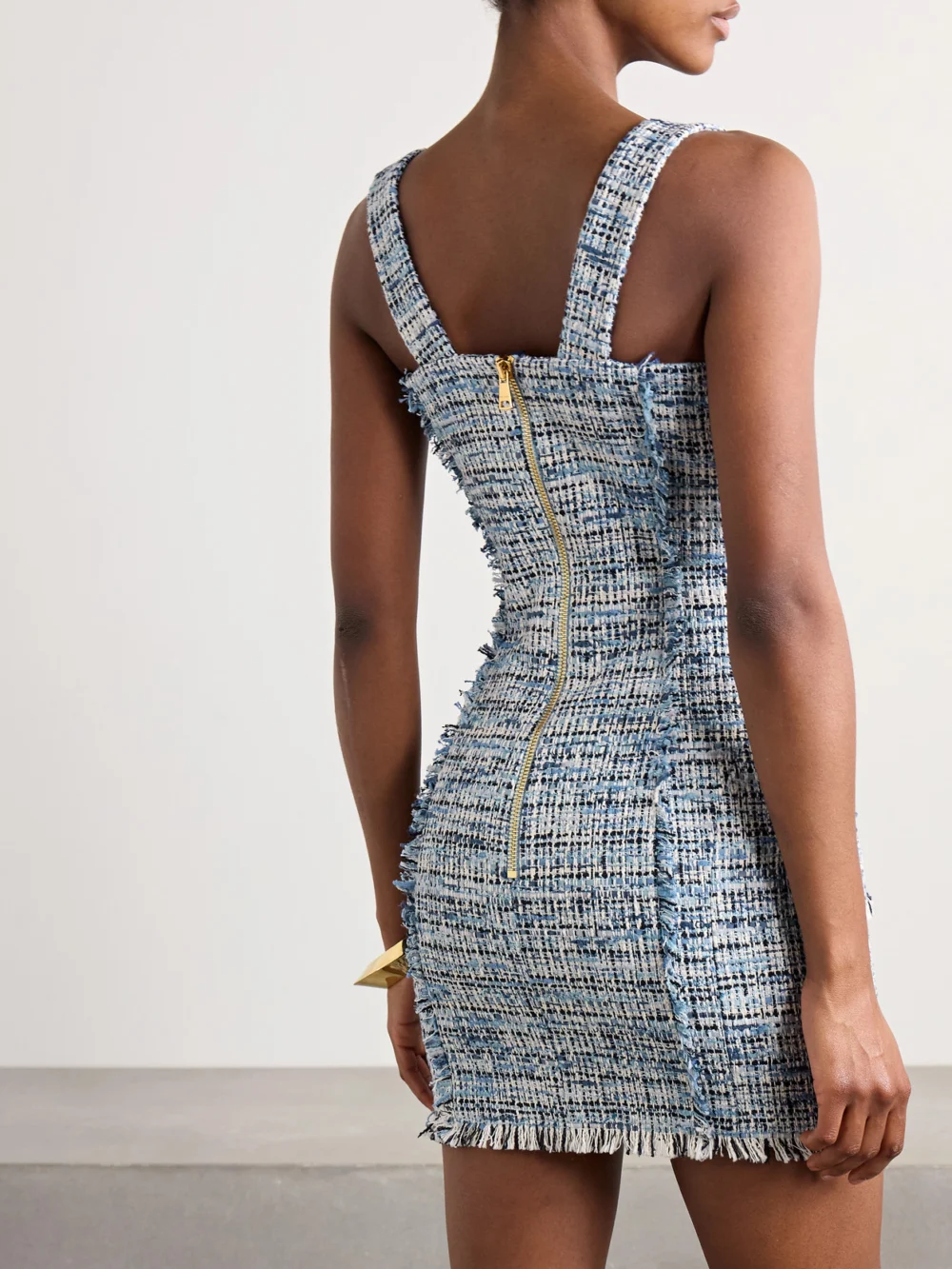 Back view of the Balmain Button-embellished Frayed Cotton-blend Tweed Mini Dress