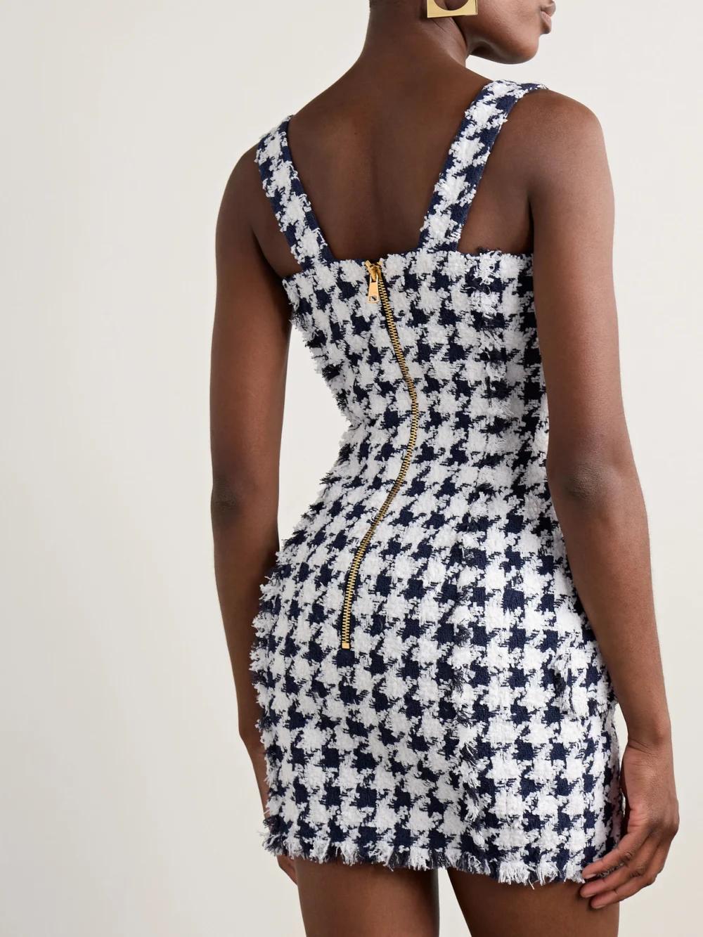 Back view of the Balmain Button-embellished Frayed Tweed Mini Dress