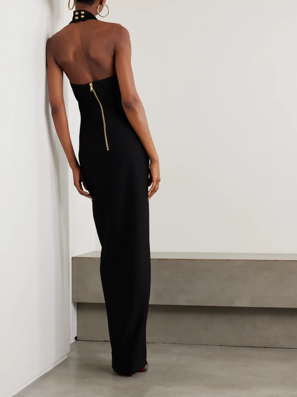 Back view of the Balmain Button-embellished Knitted Halterneck Maxi Dress