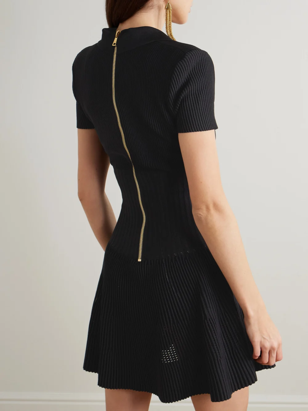 Back view of the Balmain Button-embellished Ribbed Knit Mini Dress