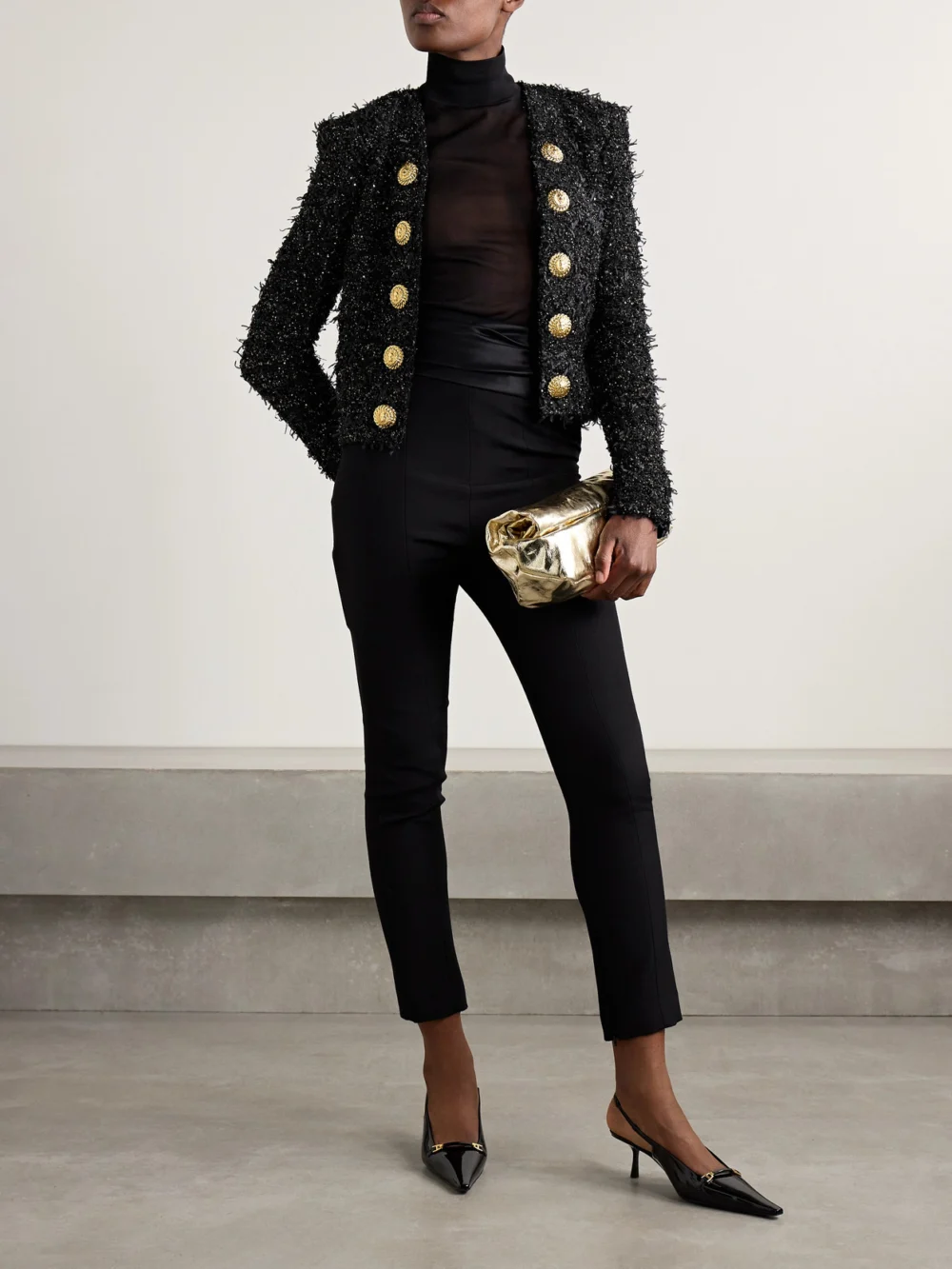 Balmain Button-embellished Sequined Metallic Bouclé-tweed Jacket, worn by a model
