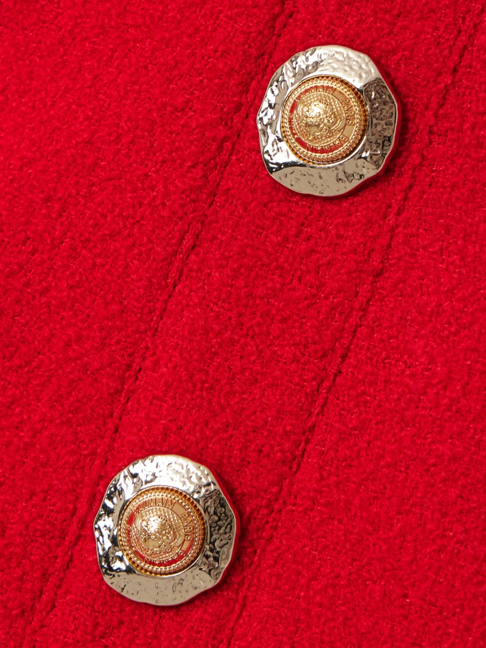 Close-up detail of the Balmain Cropped Button-embellished Wool-blend Bouclé Top