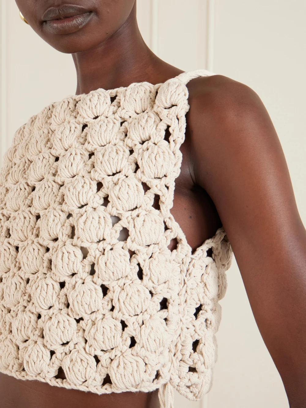 Close-up detail of the Balmain Cropped Crochet Cotton Top