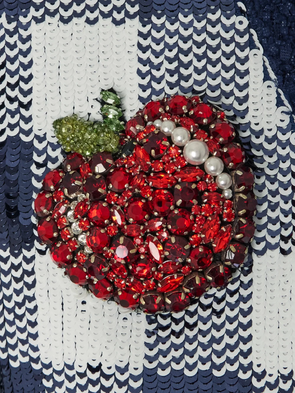 Close-up detail of the Balmain Cropped Embellished Checked Tweed Jacket