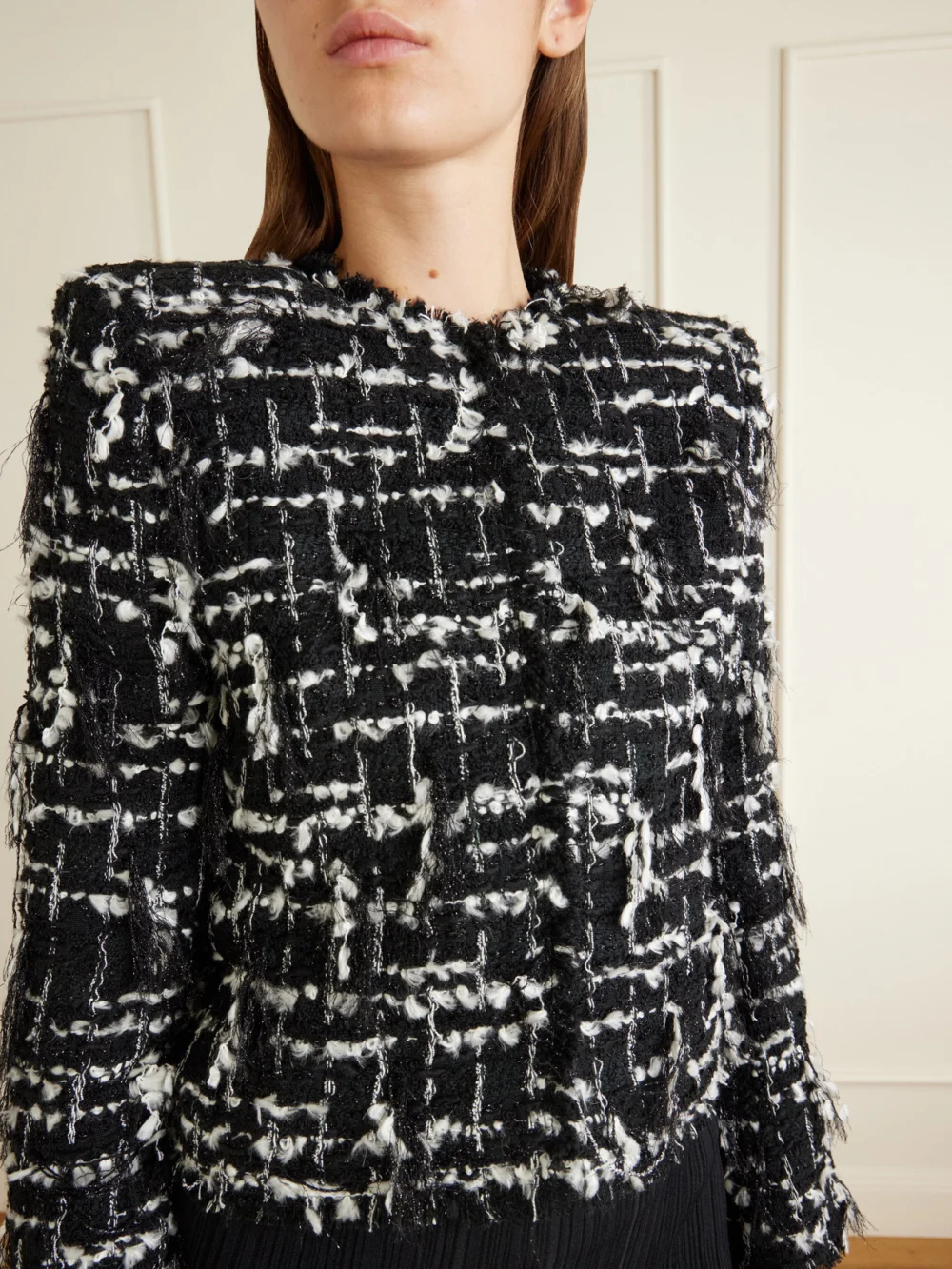 Close-up detail of the Balmain Cropped Embellished Metallic Tweed Jacket