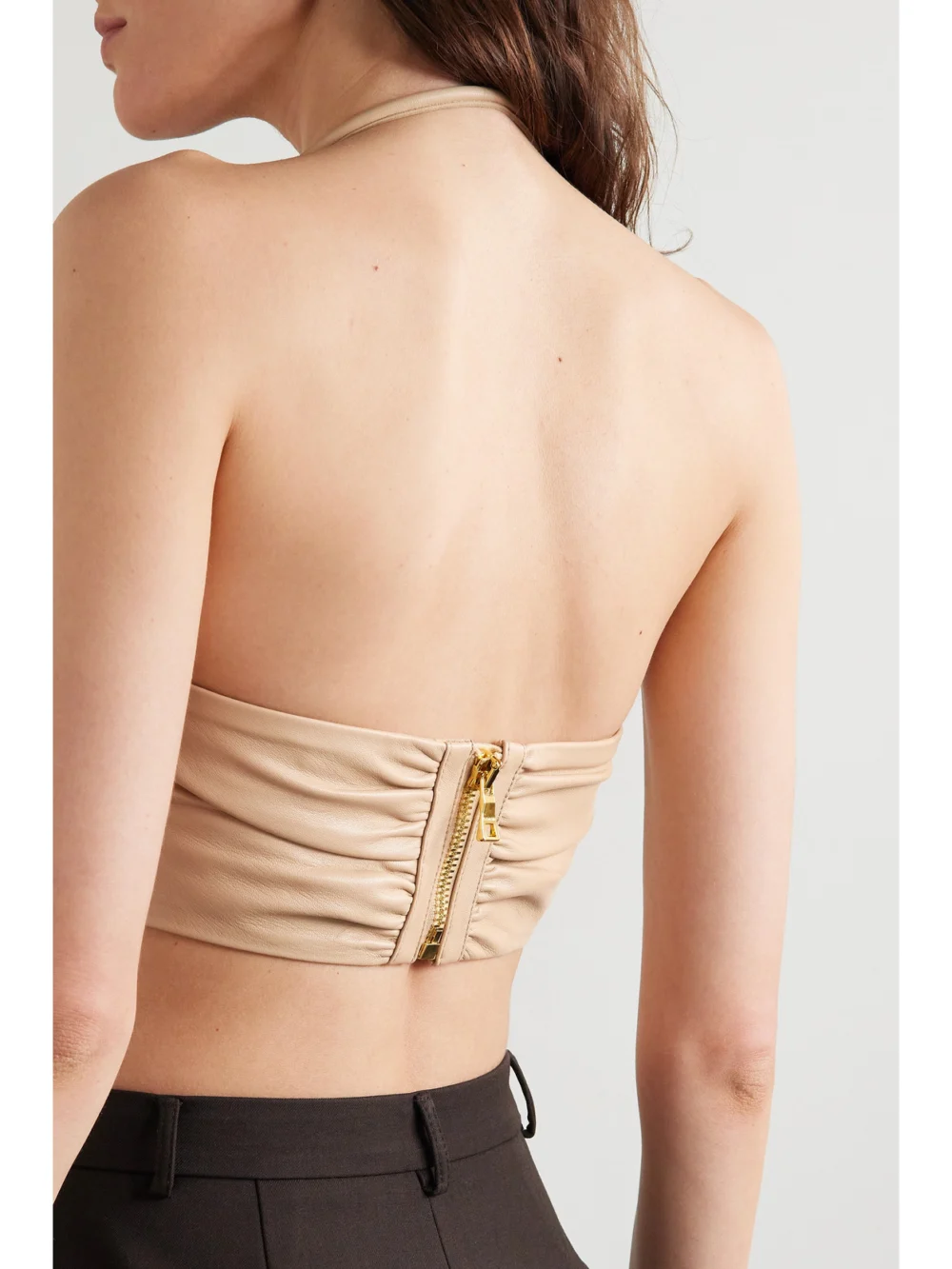 Back view of the Balmain Cropped Gathered Leather Halterneck Top