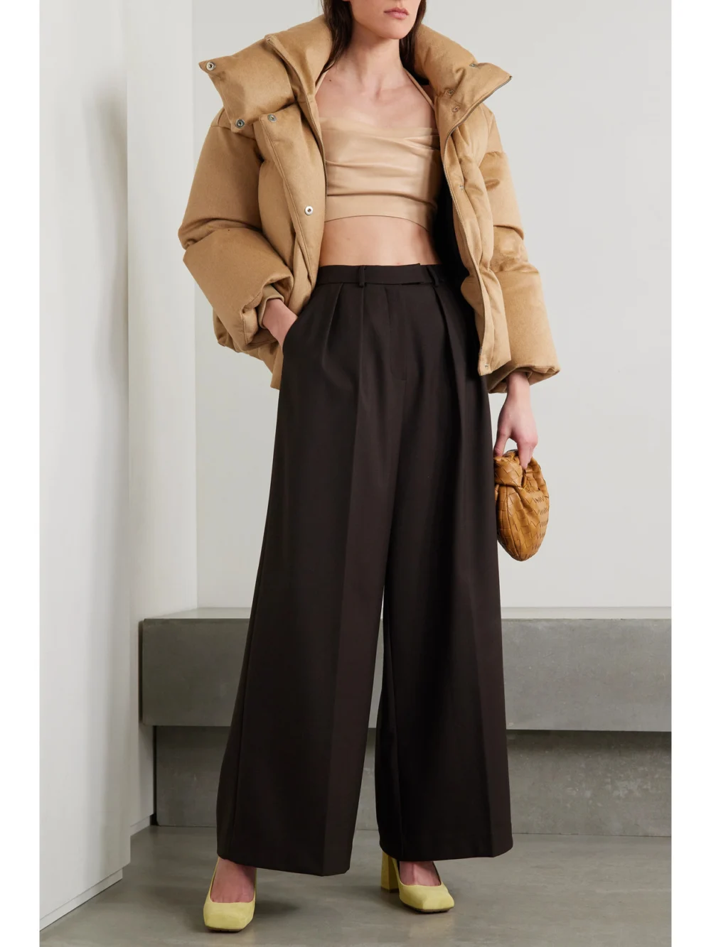 Balmain Cropped Gathered Leather Halterneck Top, worn by a model