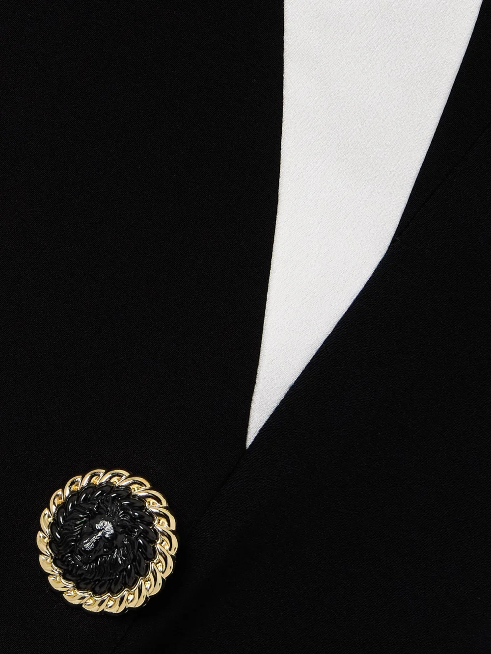 Close-up detail of the Balmain Draped Two-tone Crepe Gown
