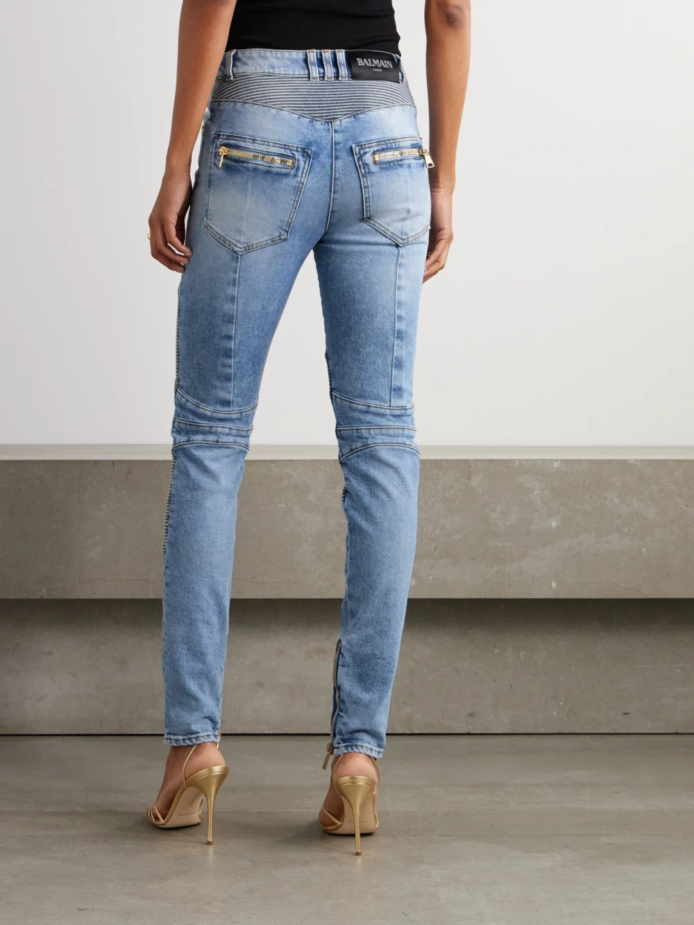 Back view of the Balmain Embellished Paneled High-rise Skinny Jeans