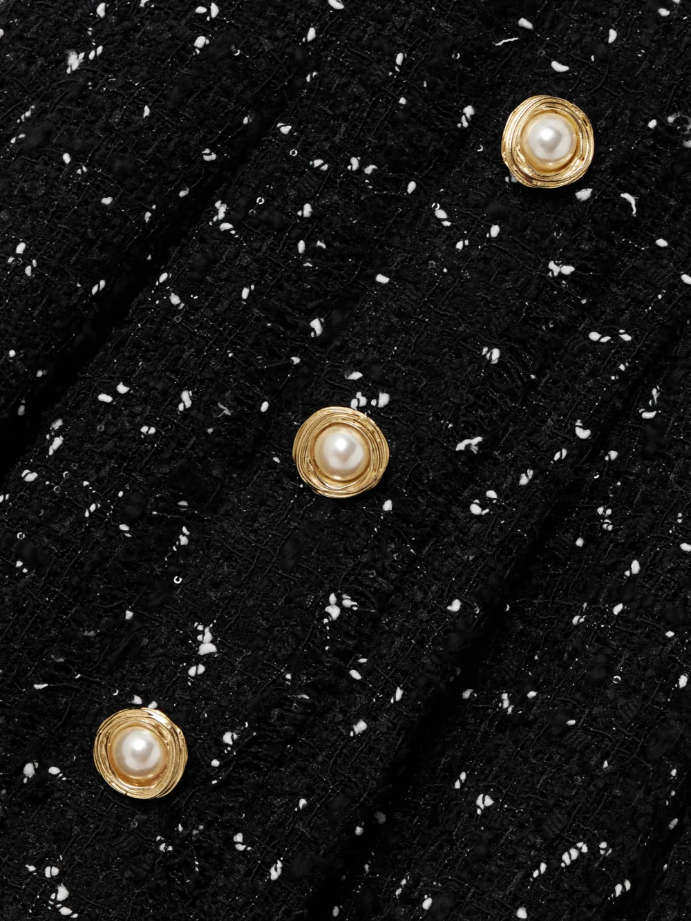 Close-up detail of the Balmain Embellished Tweed Mini Dress