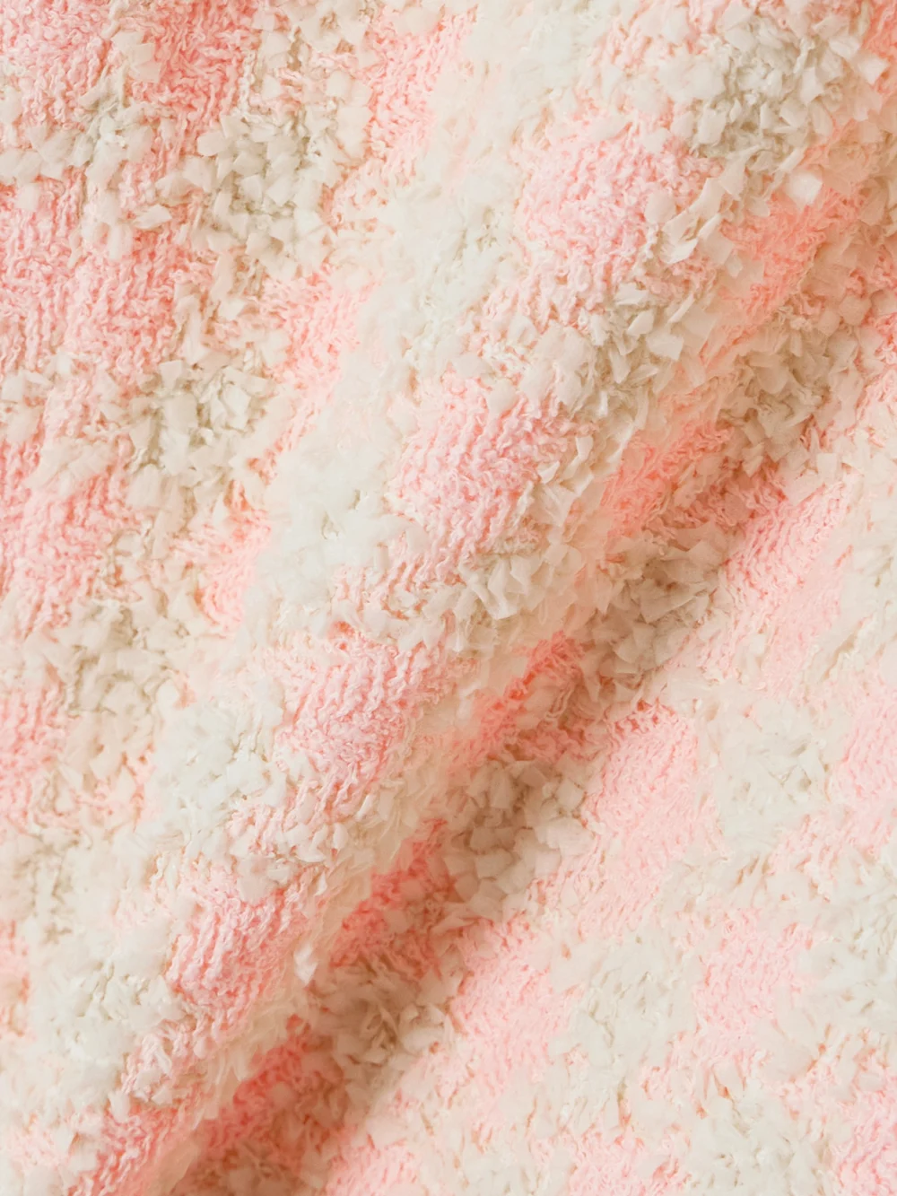 Close-up detail of the Balmain Frayed Checked Tweed Mini Dress