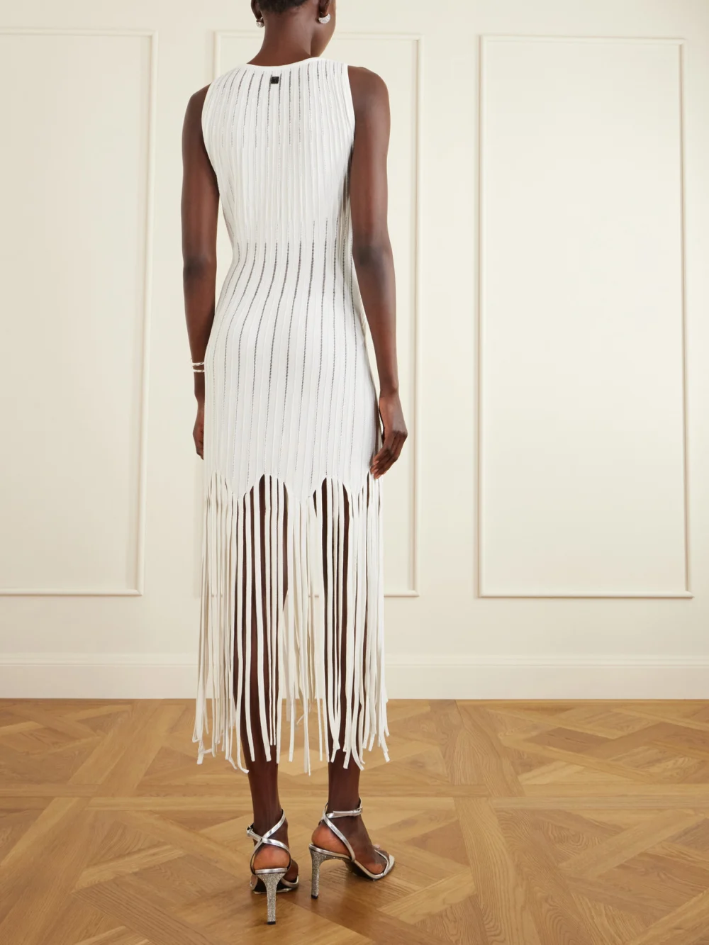 Back view of the Balmain Fringed Pointelle-knit Midi Dress