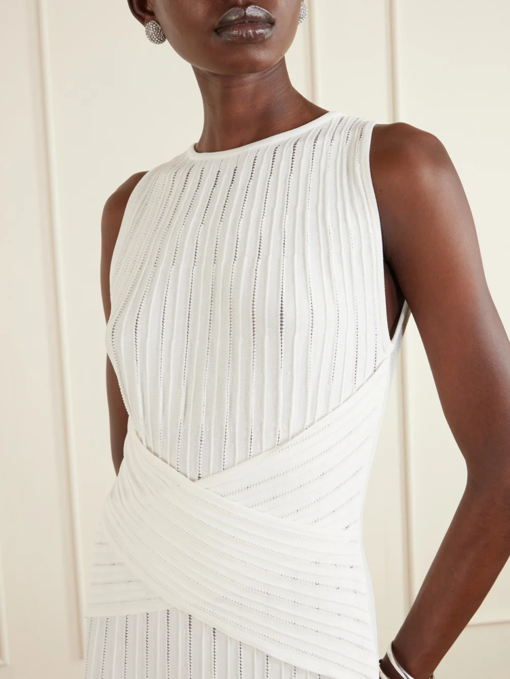 Close-up detail of the Balmain Fringed Pointelle-knit Midi Dress