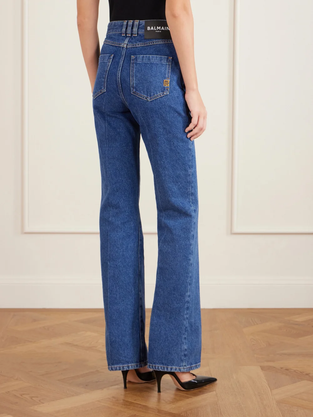 Back view of the Balmain High-rise Bootcut Jeans