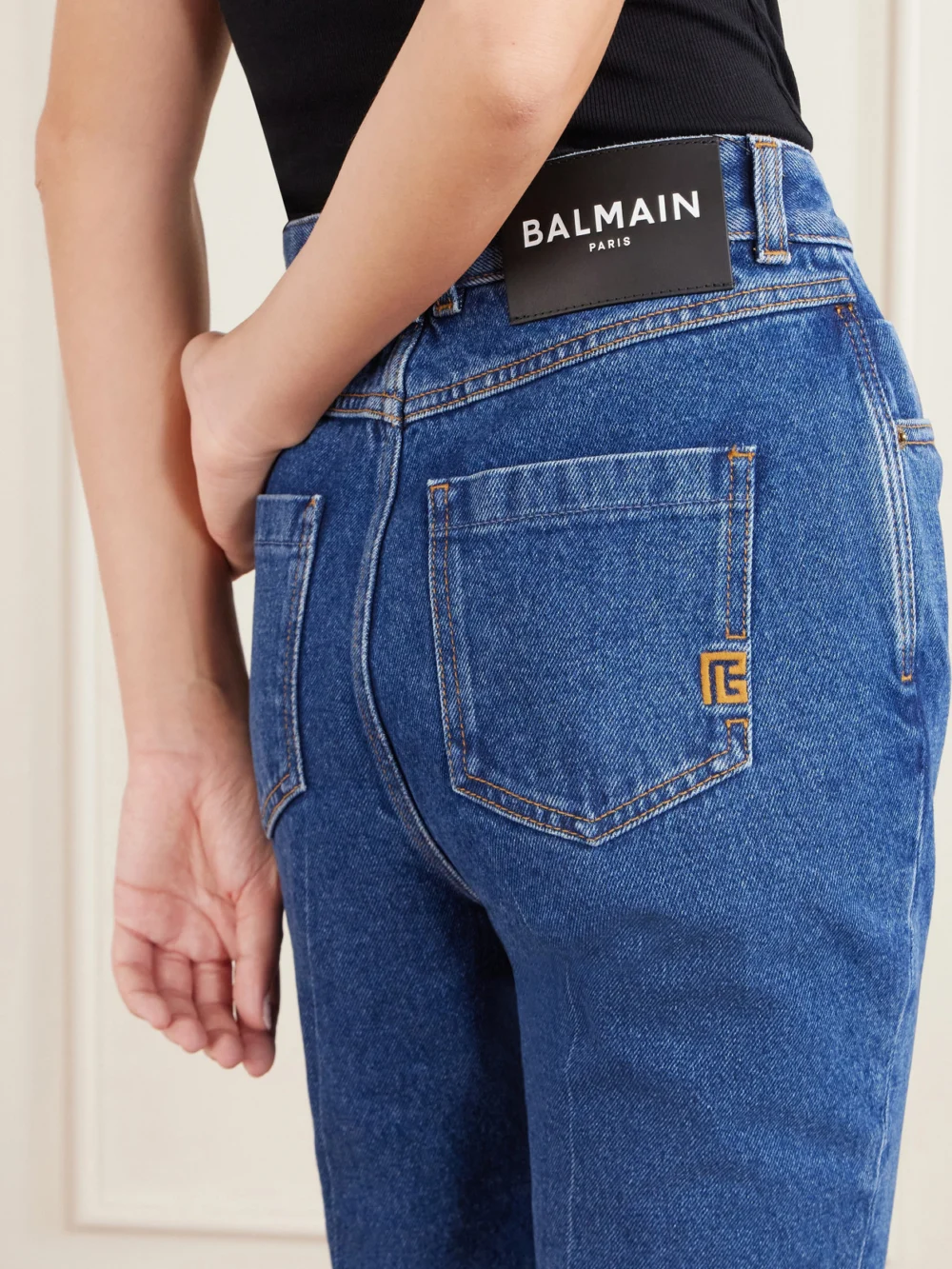 Close-up detail of the Balmain High-rise Bootcut Jeans