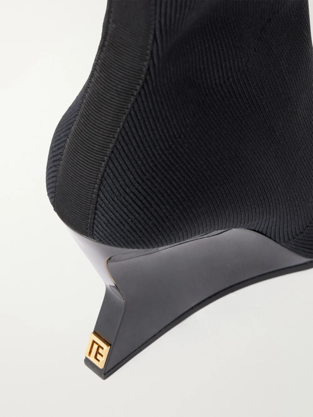 Close-up detail of the Balmain Knitted Wedge Ankle Boots