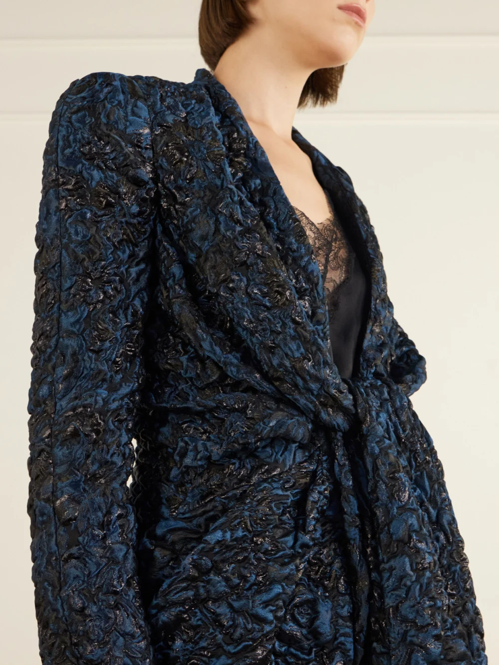 Close-up detail of the Balmain Knotted Floral-jacquard Jacket