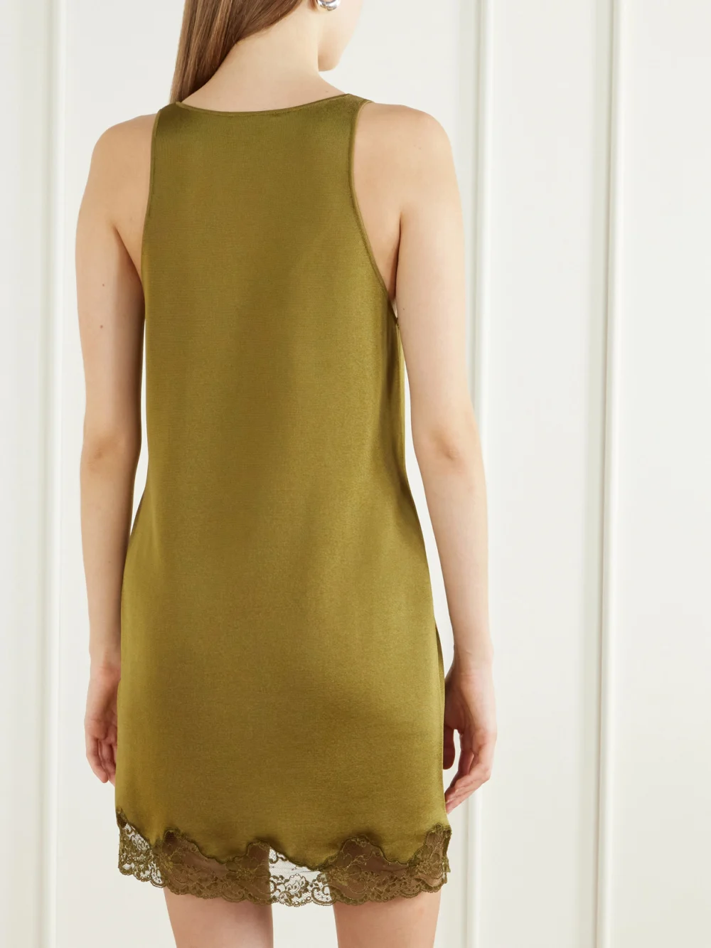 Back view of the Balmain Lace-trimmed Knitted Mini Dress