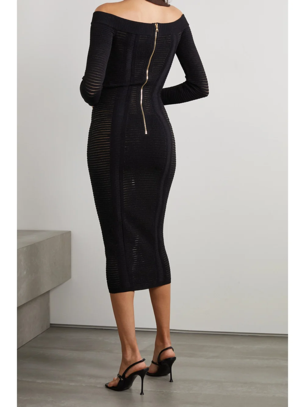 Back view of the Balmain Off-the-shoulder Ribbed-knit Midi Dress